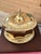 Antique Large brass footed and lidded box. It measures 9 by 7 by 8.5 inches. It has handles on the side. It does have a...