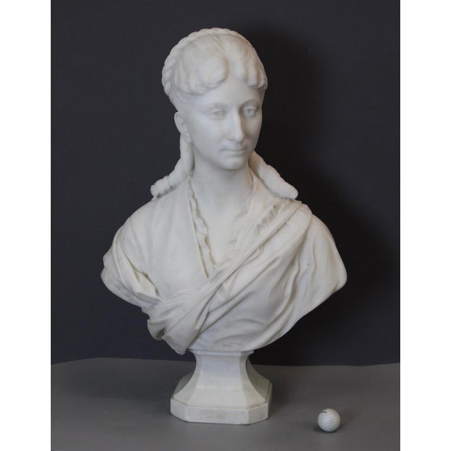 Important Carrara marble bust of a woman, probably the wife of Napoleon III, signed and dated HF Iselin 1873 for Henri...