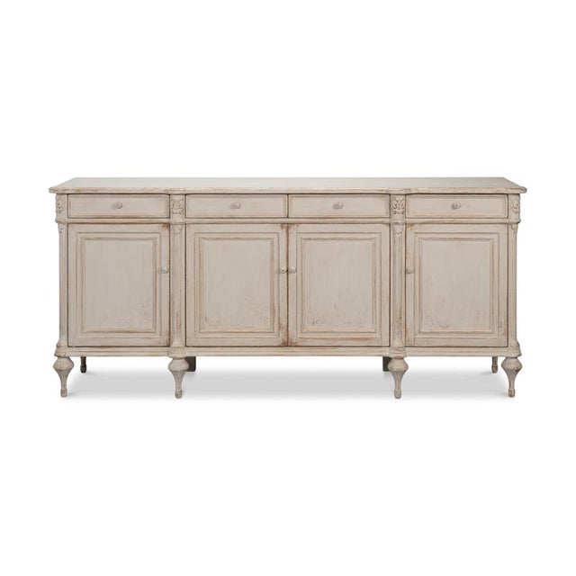 The sideboard brings refined countryside elegance to classic interiors through its soft-painted and distressed finish and...