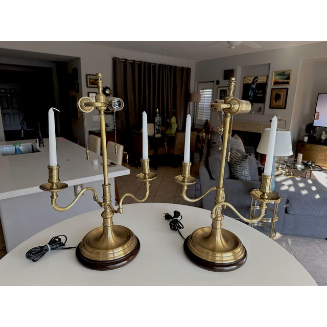 Pair of brass candleholder bouillotte 2 light table lamps by Wildwood Lamps. Each has 2 lights with on off pull chain....