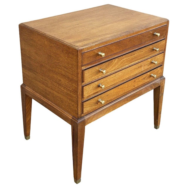 A unique chest of drawers set containing four fold out side table stands used for tv dinners and party trays. Each...