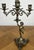 A striking Vintage French candelabra featuring an elegant cherub figure supporting five beautifully shaped candle arms...