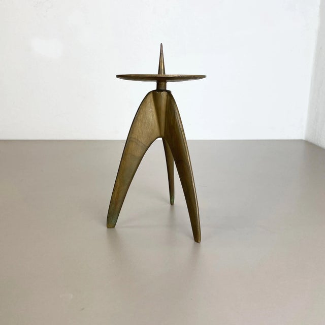Article: Sculptural candleholder Origin: Germany Material: Solid brass Decade: 1970s This original vintage candleholder,...