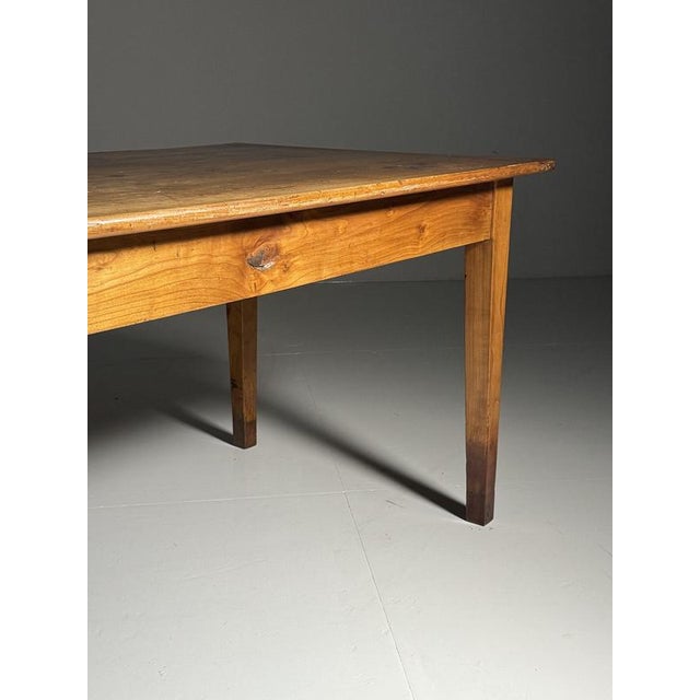 Early 19th-century french farmhouse dining table. Beautiful details including mortise and tenon joints and tapered legs....