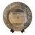 A coordinated set of four Pier 1 Imports wooden charger plates featuring carved leaf-and-vine borders accented with a soft...