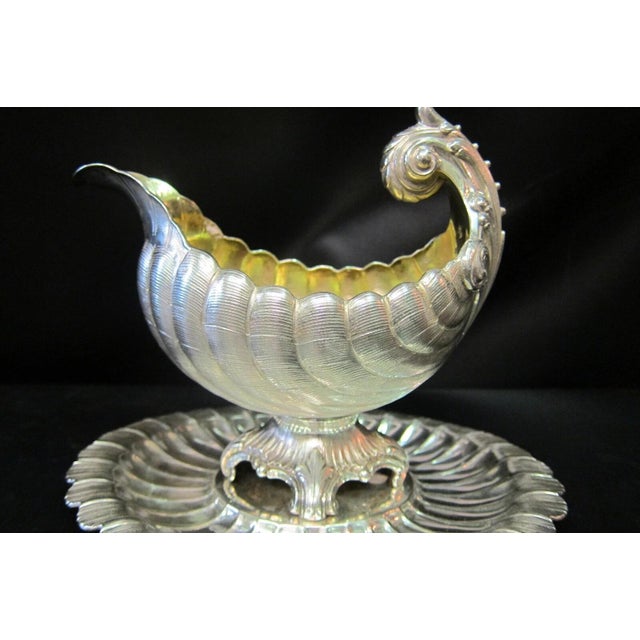 This vintage early 20th century ornamental 800 silver sauce boat is beautifully designed by the German silversmith,...