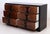 1940s Modernage walnut six-drawer dresser in the manner of James Mont with elegant rosewood "X" shaped pulls. Starburst...