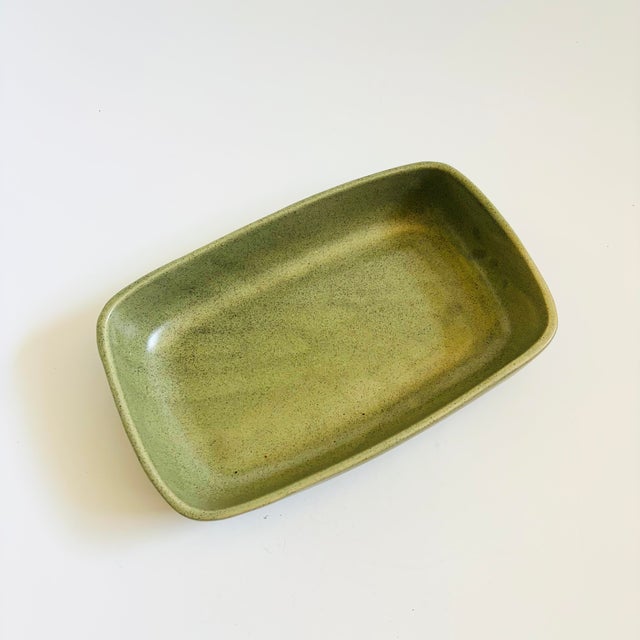 A vintage pottery serving tray by Haeger finished in a lovely speckled green glaze. Rectangular shape. Perfect for using...