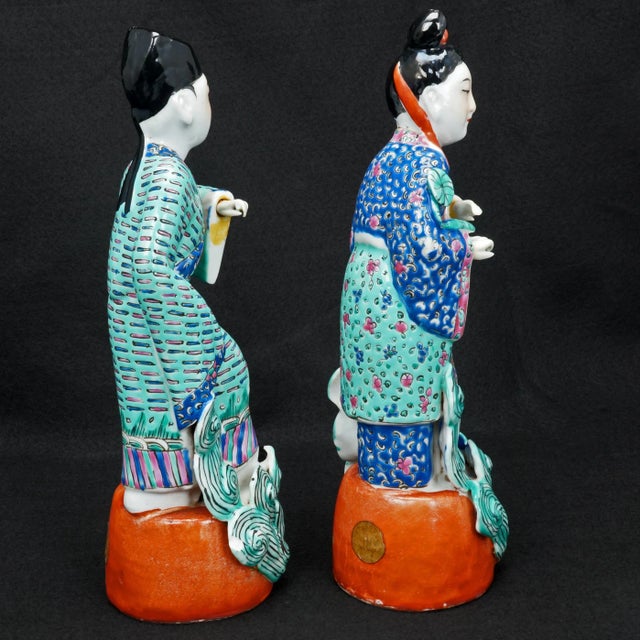 A colorful, large, intricate, detailed polychrome pair of a Chinese nobleman and his wife that show very much hand work....