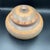 Great lidded etched pottery vessel.. Multiple courses of incise work and colors..