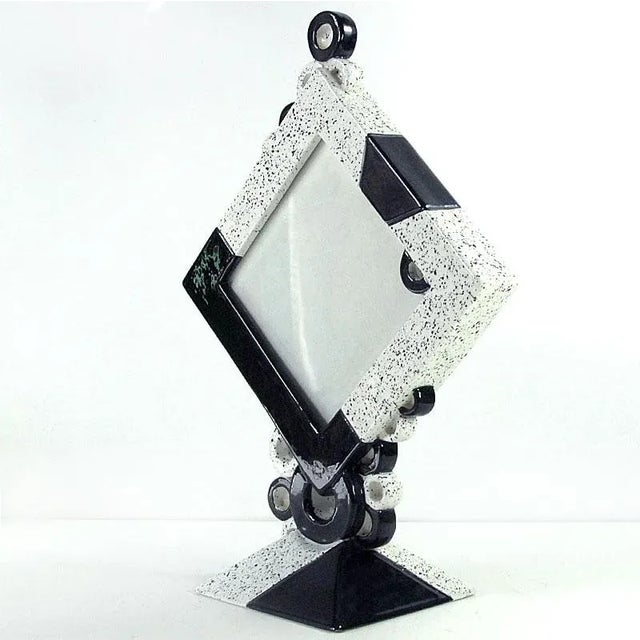 A highly decorative, postmodern photograph frame made of glazed ceramic. Made in Italy by the Nove ceramics factory in the...