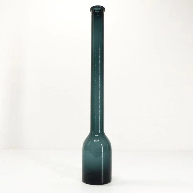 Very large vase bottle soliflore in thick petroleum blue blown glass. Beautiful general condition. Beautiful effect....