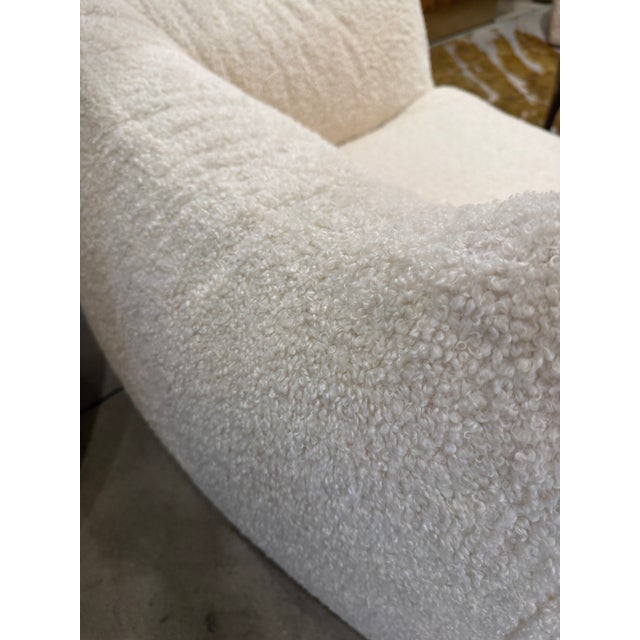 Iconic Bambole collection designed by Mario Bellini, this luxurious lounge chair embodies the perfect balance of...