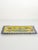 Charming colorful ceramic trinket tray from circa 1910 France, distinguished by its vibrant yellow background, deep cobalt...