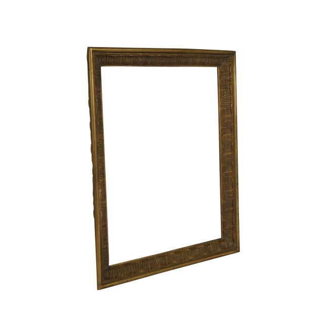 Antique heavy gilt bronze picture / mirror frame, cast to resemble a carved giltwood frame. Beveled edge decorated with an...