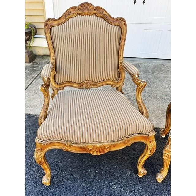 Nice pair of French style armchairs. The finish is actually more of a faux grain painted finish even though it looks like...