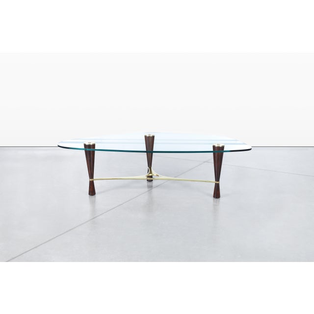 The vintage rosewood coffee table designed by Edward Wormley, model 5309, is a stunning example of mid-century modern...