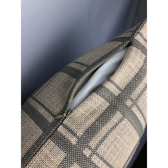 This contemporary plaid in linen and natural fiber from Donghia. This fabric has a beautiful hand and weight. It is done...