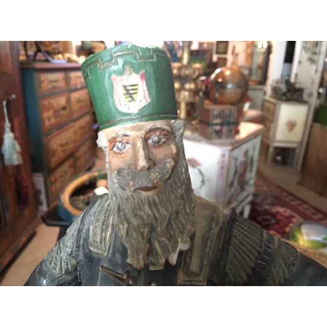 A 19th century wood carved sculpture of a Hessian soldier — nice detail and original paint. Measures 14.25"H x 4.5"W. Old...