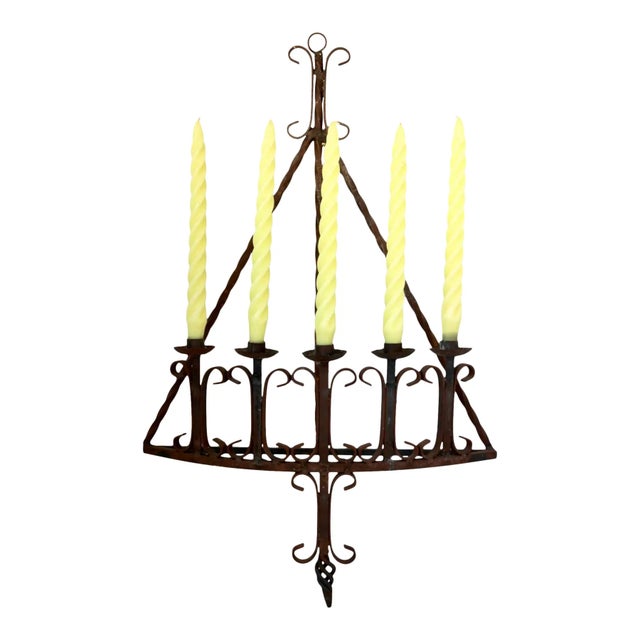 Early 20th-century hand-forged wrought iron wall candelabra, crafted in California in the Mission Revival style. The...