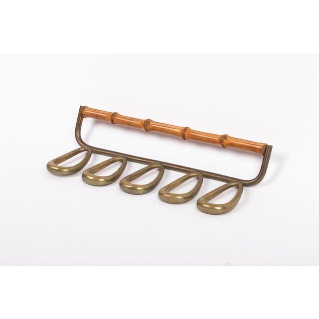 Carl Auböck pipe holder, Austria, 1960s. This piece is attributed to the mentioned designer/maker. It has no attribution...