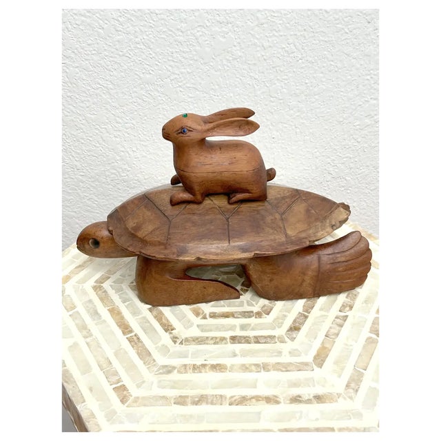 I imagined bringing the rabbit together with the tortoise. Since the rabbit wasn't a swimmer it was my intention for them...