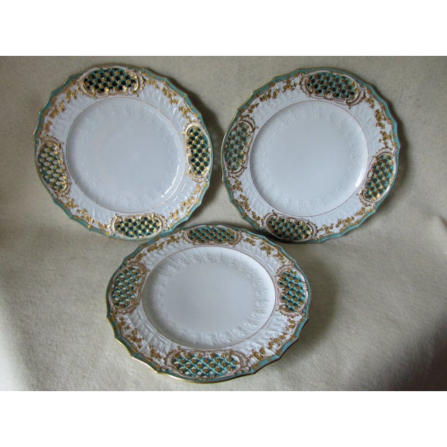 A very beautiful set of 3 Antique Porcelain Plates by Fischer & Mieg. The Plates feature a delicate reticulated lattice...