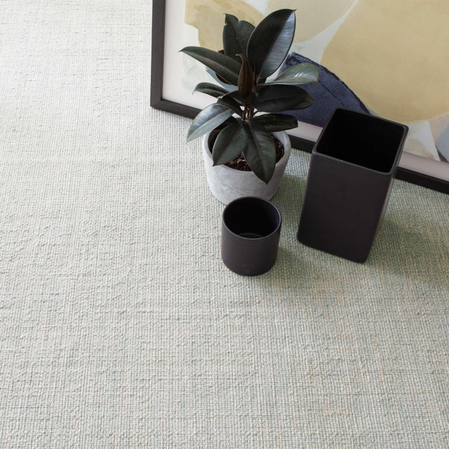 Build in blue from the ground up with this subtly marled woven cotton rug, made by mixing cotton yarns in shades of ivory,...