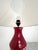 Red glazed ceramic table lamp, in the style of the Cloutiers brothers, France circa 1950 European Plug (up to 250V).The...