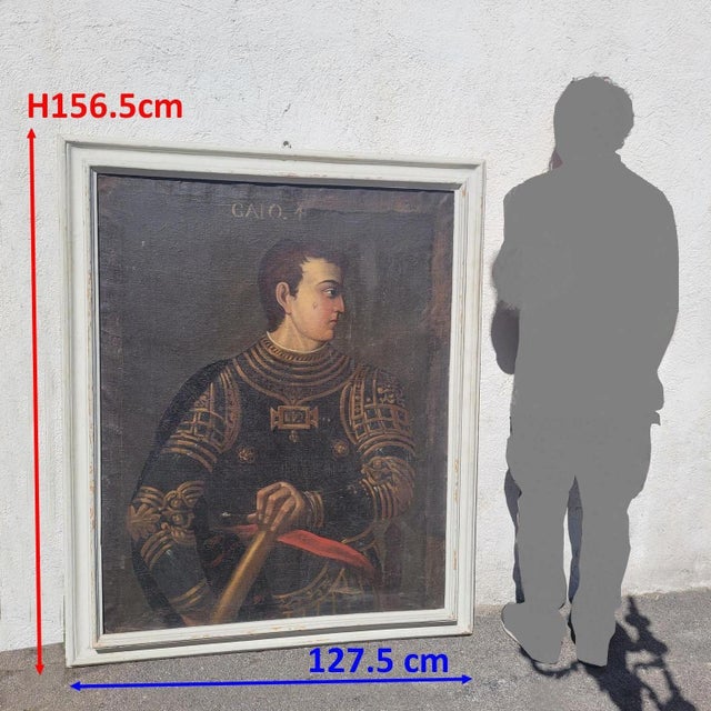Large framed oil on canvas depicting Emperor Caligula: in profile, he wears black armor embellished with gold motifs, his...