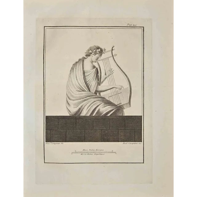Lyre player from "antiquities of herculaneum", is an original etching on paper realized by ferdinando campana in the 18th...