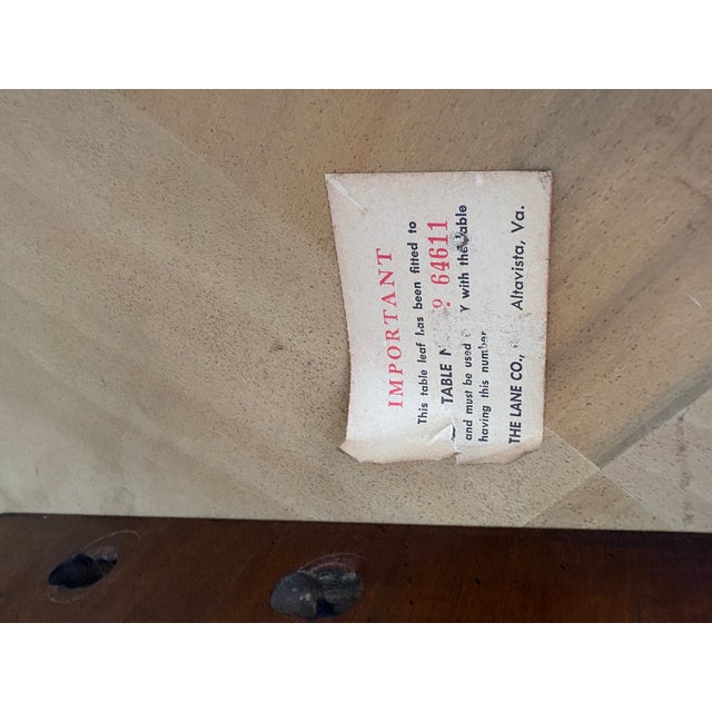 Lane Staccato dining table with two additional leaves. Great design with the parquetry top and contrasting single tone...