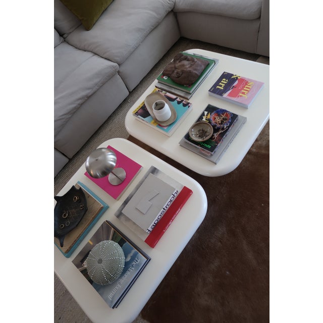 Like a little altar to good taste. This postmodern coffee table brings peak '80s energy with its chunky plinth base,...