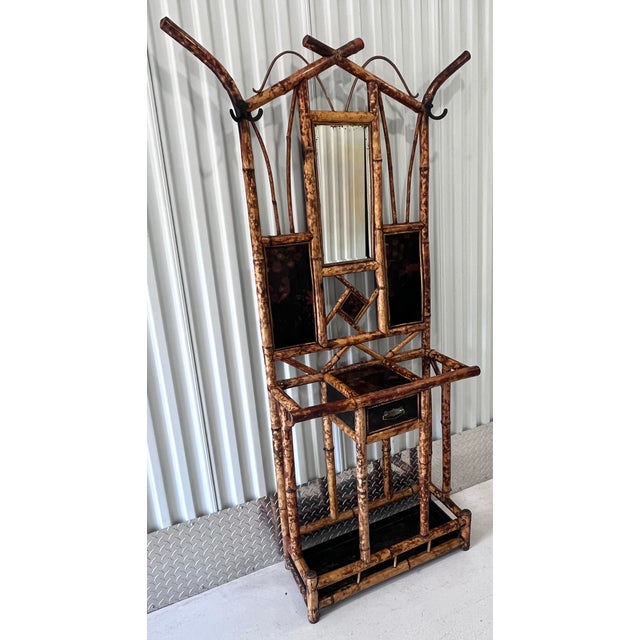 Gorgeous scorched faux bamboo hall tree. This amazing chinoiserie style umbrella stand includes a beveled mirror, antique...