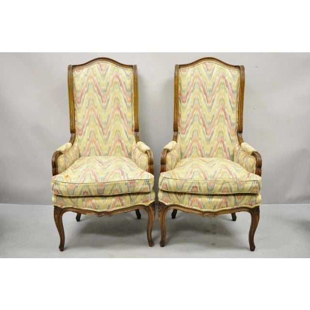 Vintage French Country Provincial High Back Walnut Arm Chairs (A) - a Pair. Item features sleek narrow frames, tall...