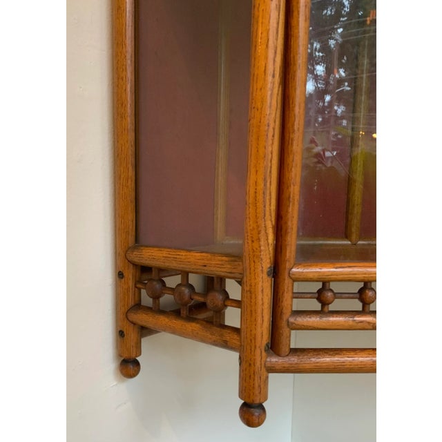 Unique Mid-Century Modern Vintage Oak Wall Corner Cabinet, glass fronts, red fabric back, circa 1900’s, I have another one...