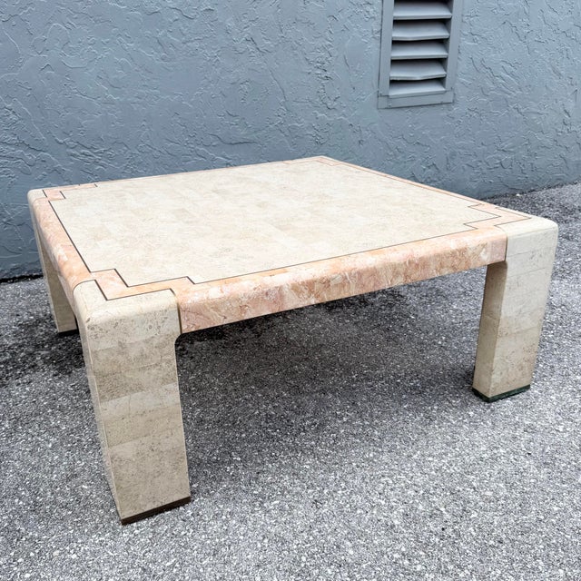 This postmodern square coffee table showcases the artistry of tessellated stone in a soft beige and blush palette. Small...