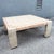 This postmodern square coffee table showcases the artistry of tessellated stone in a soft beige and blush palette. Small...