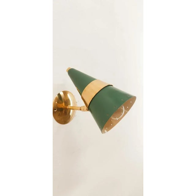 Adjustable Sconce in Green and Gold, in Flawless conditions. Designed 1970 to 1979 Up to 250V (Europe/UK Standard).The...