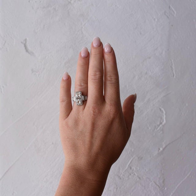 An absolute masterpiece of 1920s avant-garde design, this antique Art Deco "Toi et Moi" (You and Me) ring is entirely...