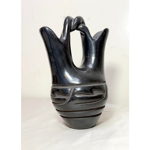 Up for sale is a nice quality vintage handmade Santa Clara Native American Pueblo pottery wedding bowl done by artists...