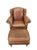 Vintage leather wingback lounge chair and matching ottoman by Milling Road, a division of Baker Furniture. The set...