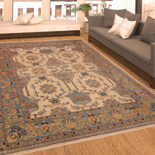 "Enhance the ambiance of your home with this magnificent Persian-influenced Turkish hand-knotted rug made by skilled...