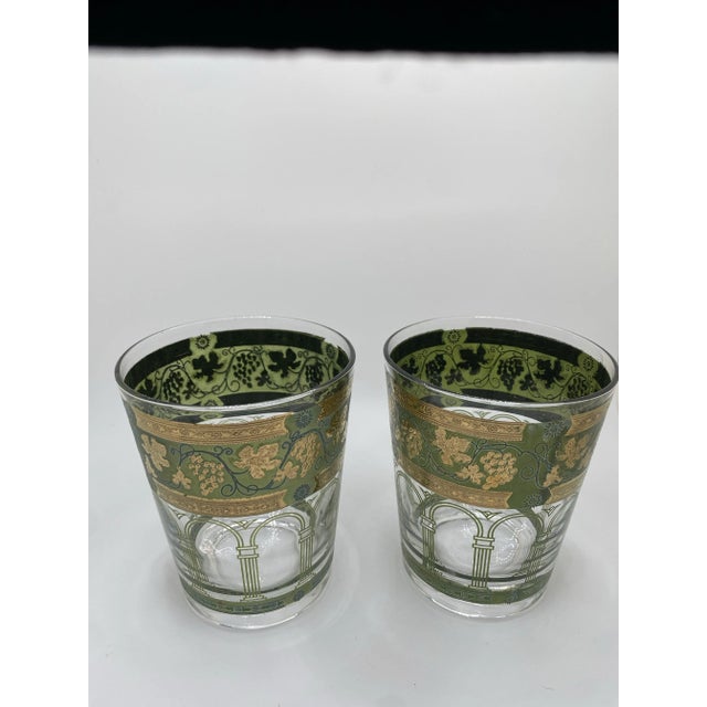 These elegant tumblers are the epitome of mid-century charm. The golden grapes and green flat bottom design are...