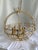 A vintage Art Deco style indoor gold chandelier. Beautifully designed and in working condition,.