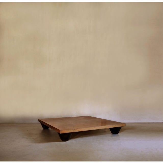 A raised wooden platform, originally conceived as a display corner for the domestic objects designed by Achille...