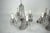 A rare and exquisite pair of authentic 1940s crystal candelabra table lamps, showcasing the elegance of Mid-Century...