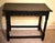 A baroque form English 17th century side table is of dark oak or elm. The overhang is detailed with leafage carving. The...