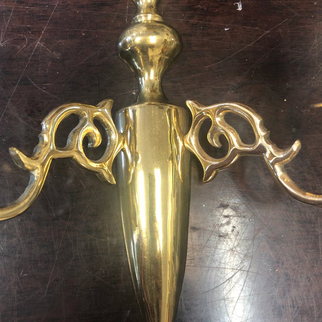 Beautiful brass candle holder. Perfect for any wall and for the interior designer.