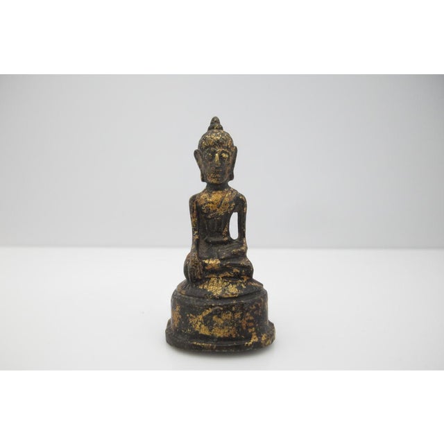 Thai Ayutthaya style bronze Buddha figurine. Buddha figure seated in meditational pose with one hand to the earth. Nice...